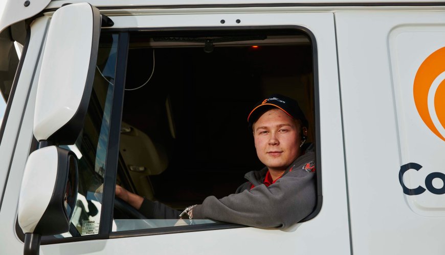 Happy ColliCare-driver looks at the customers who has just received predictable goods and cargo.